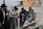 Jews burn leavened bread on Passover eve in the Upper Galilee town of Safed