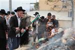 Jews burn leavened bread on Passover eve in the Upper Galilee town of Safed