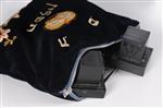 a pair of tefillin in their velvet bag 