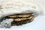 Hand matza in a silk covering