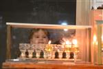 Lighting Hanukkah candles