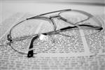 Glasses are placed on the Talmud book