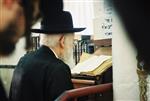 The arbiter, Rabbi Shalom Yosef Elyashiv, in Jerusalem