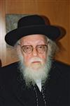 The arbiter, Rabbi Shalom Yosef Elyashiv, in Jerusalem