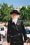 The arbiter, Rabbi Shalom Yosef Elyashiv, in Jerusalem