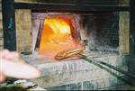 Unleavened bread are baked in a special oven for Kosher for Passover matzos