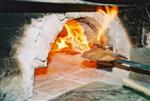 Unleavened bread are baked in a special oven for Kosher for Passover matzos