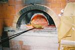 Unleavened bread are baked in a special oven for Kosher for Passover matzos