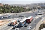 People and machines build and renovate the paths the capital city - Jerusalem