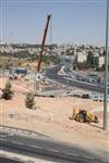 People and machines build and renovate the paths the capital city - Jerusalem