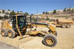 People and machines build and renovate the paths the capital city - Jerusalem