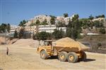 People and machines build and renovate the paths the capital city - Jerusalem