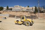 People and machines build and renovate the paths the capital city - Jerusalem