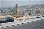 People and machines build and renovate the paths the capital city - Jerusalem