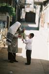 Jewish choose and shake the Four Species on Sukkot