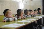 Children learn to read letters of the alphabet