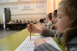 Children learn to read letters of the alphabet