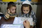 Children learn to read letters of the alphabet