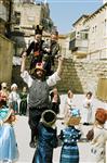 Children celebrate Purim with costumes and disguises