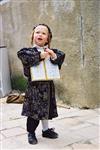 Children celebrate Purim with costumes and disguises
