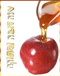 כרטיס ברכה לראש השנה עם תמונה דבש נשפך על תפוח ואותיות עשוים מדבש