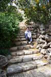  Boy sits on stairs