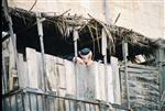 Jews build a sukkah streets of Jerusalem