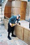 Jews build a sukkah streets of Jerusalem