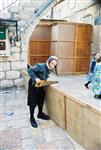 Jews build a sukkah streets of Jerusalem