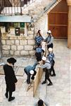 Jews build a sukkah streets of Jerusalem