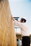 Jews build a sukkah streets of Jerusalem