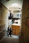 Jews build a sukkah streets of Jerusalem