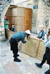 Jews build a sukkah streets of Jerusalem