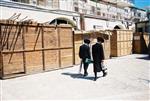 Jews build a sukkah streets of Jerusalem