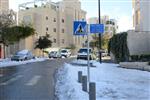 תושבי ירושלים מתעוררים לבוקר לבן ומושלג