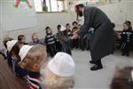 Three year old boy celebrates Upsherin