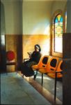 Jews praying in the synagogue with prayer shawl and phylacteries