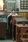 Jews praying in the synagogue with prayer shawl and phylacteries