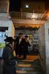 Jews praying in the synagogue with prayer shawl and phylacteries