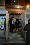 Jews praying in the synagogue with prayer shawl and phylacteries