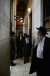 Jews praying in the synagogue with prayer shawl and phylacteries