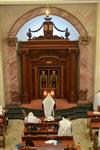 Jews praying in the synagogue with prayer shawl and phylacteries