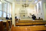 Jews pray in a synagogue in Jerusalem