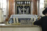 Jews pray in a synagogue in Jerusalem