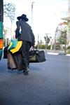 Guys are going to yeshiva