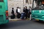 Yeshiva students by way of public transportation in Jerusalem