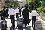 Yeshiva students by way of public transportation in Jerusalem