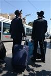 Yeshiva students by way of public transportation in Jerusalem