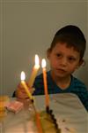 Lighting Hanukkah candles