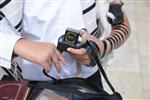 Talit and Tefilin Laying against the background the Western Wall in Jerusalem